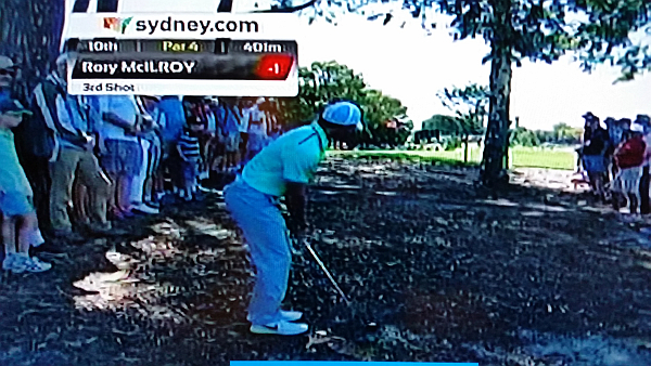 Rory McIlroy about to play his second at the 10th but he leaves the ball within the tree line but manages to save par.