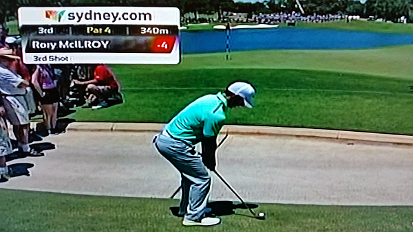 McIlroy about to play his third shot at the back of the third green.