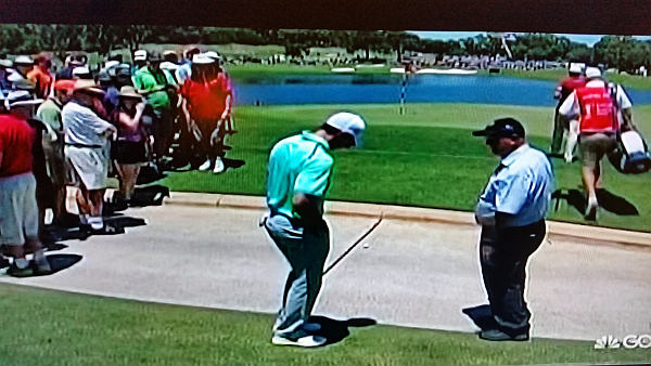 Rory gets ruling at the back of the 3rd green with his ball still on the cart path.