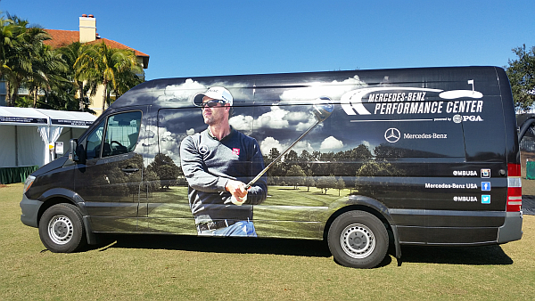 Adam Scott picture on side of Mercedes van
