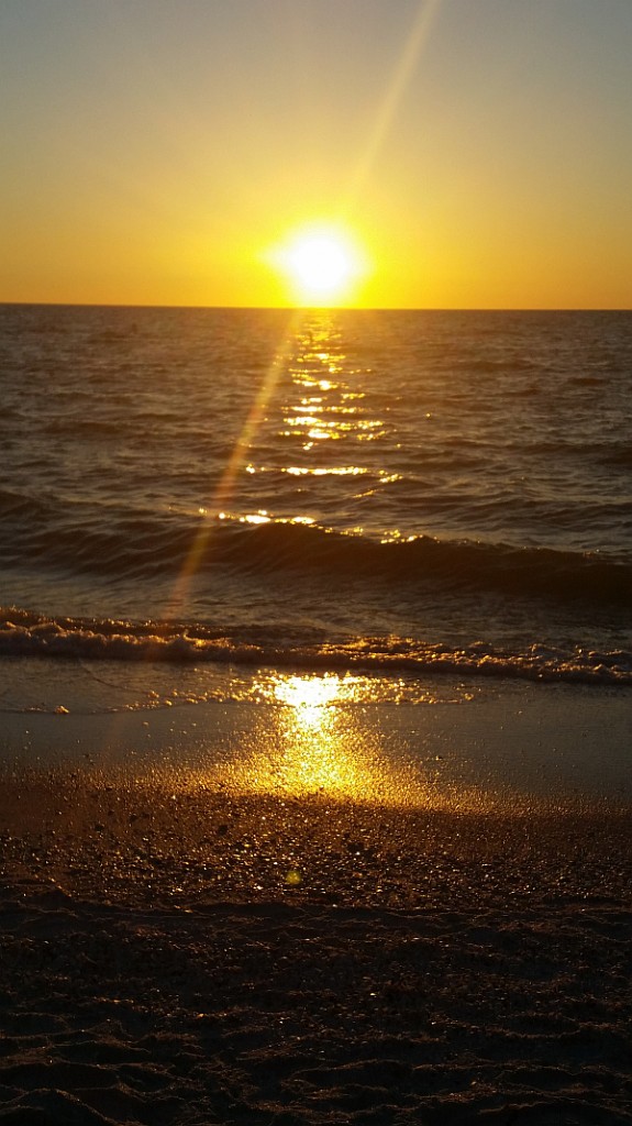 Sun sinking over the Gulf of Mexico.