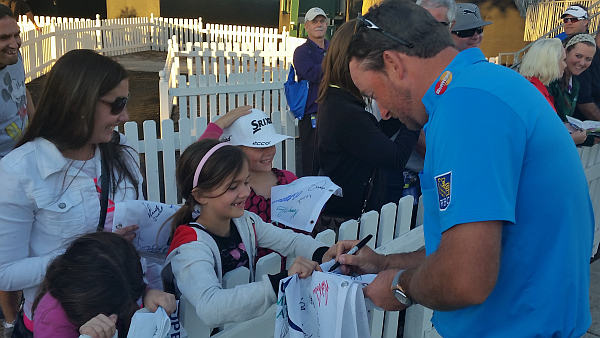 The young girl is now the proud owner of Graeme McDowell's cap. (Photo - www.golfbytourmiss.com)