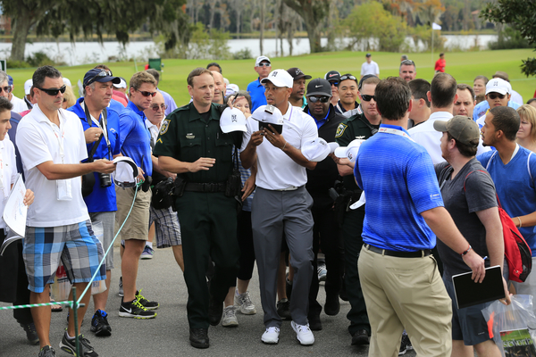 Tiger Woods mobbed as he makes his way to the 10th tee during the Hero World Challenge Pro-Am. (Photo - Fran Caffrey/www.golffile.ie)