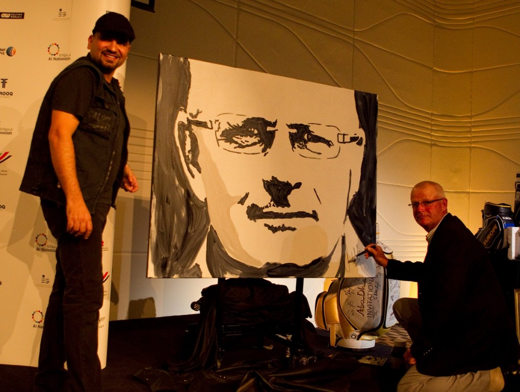 Speed painting of double Major winner Sandy Lyle raises $115,000 at the 2015 Abu Dhabi Invitational fund-raiser.