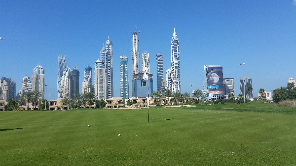Faldo Course, Emirates GC and four balls surround the hole at the par 3, 2nd hole the day after the 2015 Dubai Desert Classic.