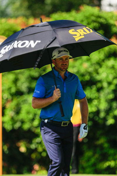 Graeme McDowell shelters himself from the intense Malaysian heat during the third round of the Maybank Malaysian Open. (Photo - Thos Caffrey/www.golffile.ie)