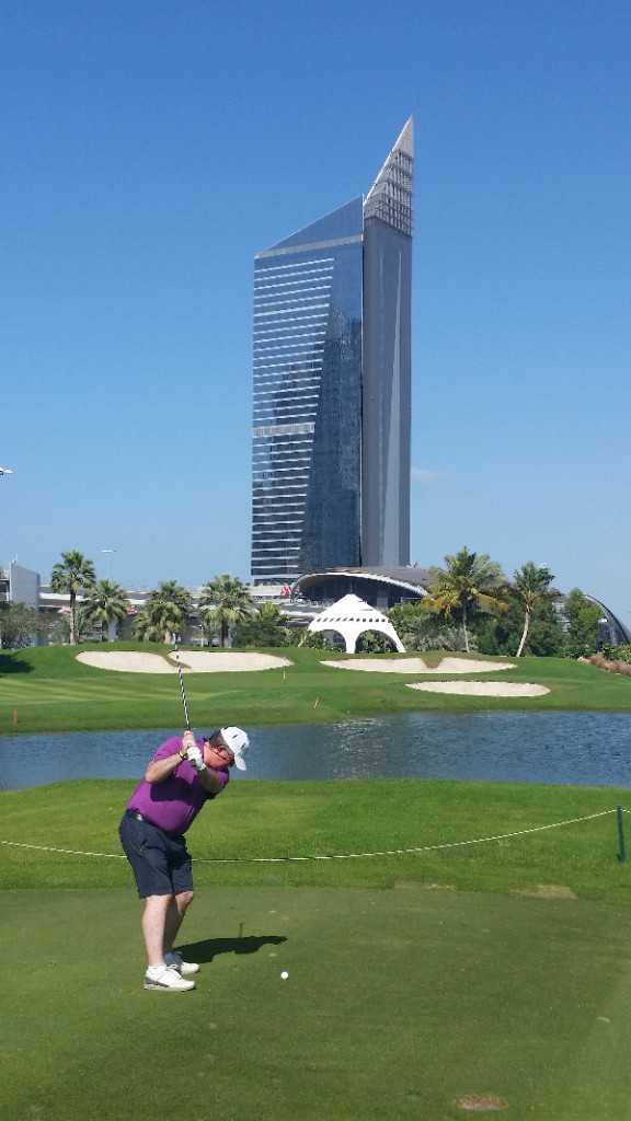 Stuart playing his second shot into par 4, 9th hole Faldo Course, Emirates GC