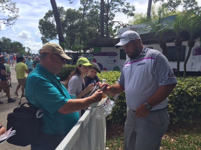 Brendan de Jonge signs autographs after taking a one shot lead on day two of the 2015 Valspar Championship. (Photo - www.golfbymiss.com)