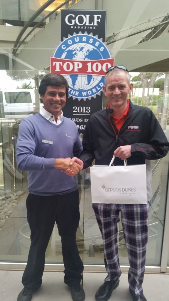 Fraser Ireland with his prize of a bottle of Oitavos Dunes red wine and with special thanks to Oitavos Dunes.