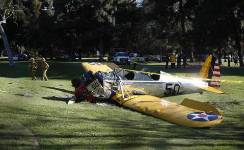 Harrison Ford crashes onto golf course.