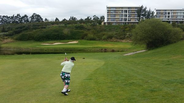 Joe Duddy wearing his 'Paddy Par' Royal & Awesome shorts hitting into the par five 6th hole.