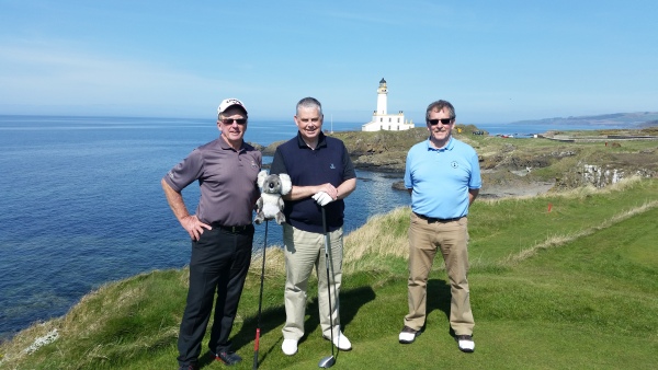 Bernie, Ken Goodwin and Trevor with the Turnberry Lighthouse as the backdrop.