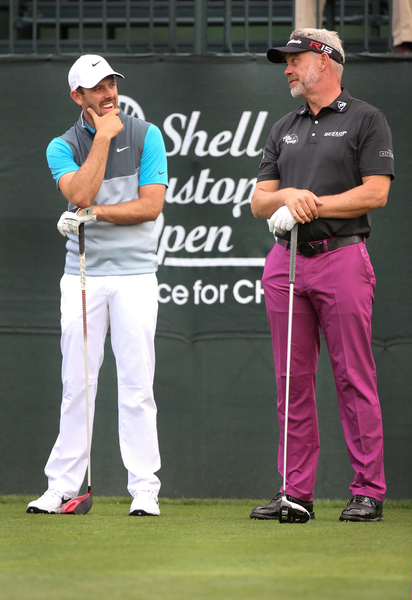 Darren Clarke and Charl Schwartzel enjoying a friendly chat during the opening round of the Shell Houston Open. (Photo - kenneth e. dennis/kendennisphoto.com)