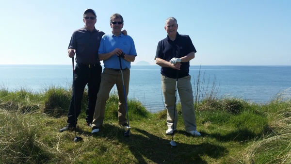 The Ailsa Crail (in background) separates Trevor Peake and Prestwick Secretary, Ken Goodwin. ... Bernie on left in pic.