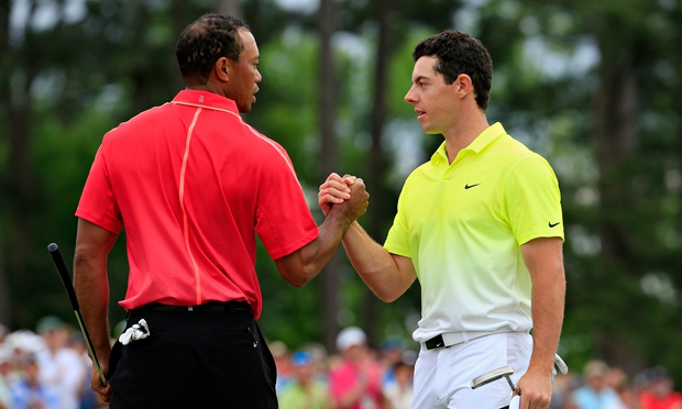 Rory McIlroy and Tiger Woods shake hands at the end of the final round of the 79th Masters. (Photo - Getty)