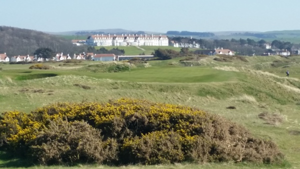 Trump Turnberry's 15th green and hotel in background.