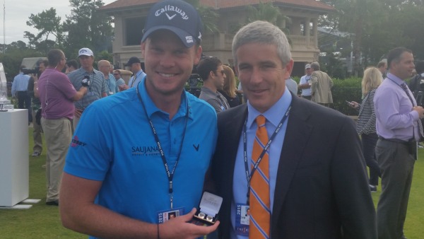 Danny Willett handed a commemorative pair of 2015 Players cuff links as one of the first timers competing at TPC Sawgrass.