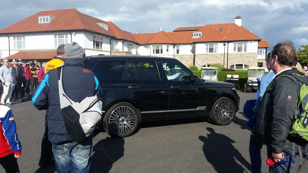 Rory McIlroy at the wheel of a V8 Range Rover and not wasting time heading to a waiting chopper.