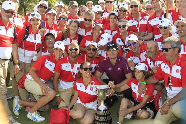 James Morrison surrounded by Open de Espana volunteers following his second Tour success. (Photo - Thos Caffrey/www.golffile.ie)