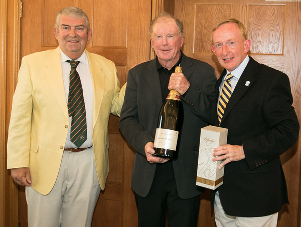 Bernie being presented with a Jereboam of Laurent & Perrier champagne (Photo - Stuart Adams/www.golftourimages.com)