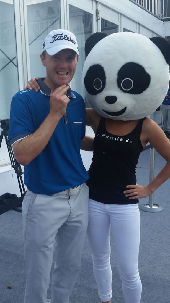 Michael Hoey found himself with his arm around a panda bear after the third round of the BMW International Open. (Photo - www.golfbytourmiss.com)