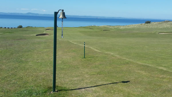 Gullane GC and a mill pond Forth of Firth in the background.