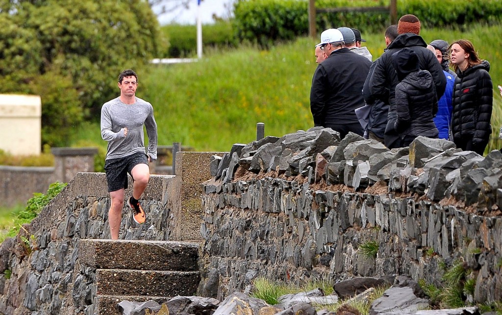 Rory McIroy pounding the pavement around the shores of Belfast.