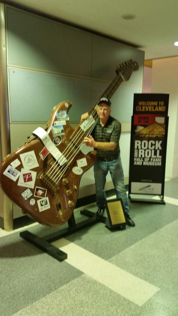 Bernie plays a tune on arrival at Cleveland Airport.