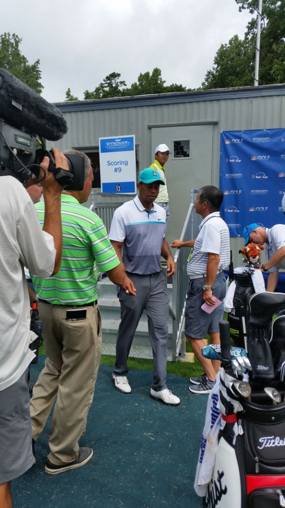 Tiger Woods leaves scorer's hut with his lowest score in two years.