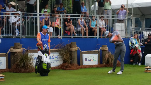 Tiger Woods uses his 2-iron off the 17th tee during today's Pro-Am.