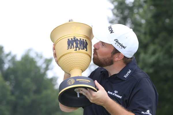 Shane Lowry plants a kiss on the WGC - Bridgestone Invitational trophy. (Photo - Eoin Clarke/www.golffile.ie)