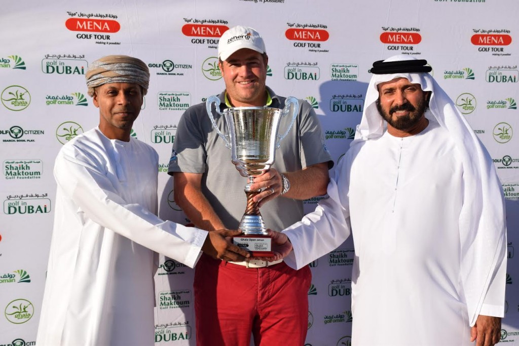England's Lee Corfield captures 2015 MENA Tour Ghala Open & seen here receiving the winner’s trophy from Ziyad Al Zubai, a board member of Ghala Golf Club, and Mohamed Juma Buamaim, Chairman of the MENA Golf Tour.