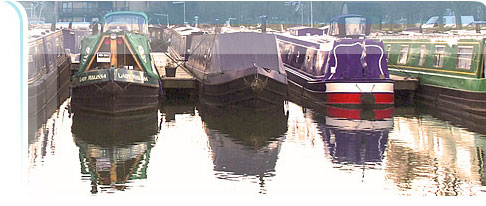Barges in a row at Milton Keynes Marina.