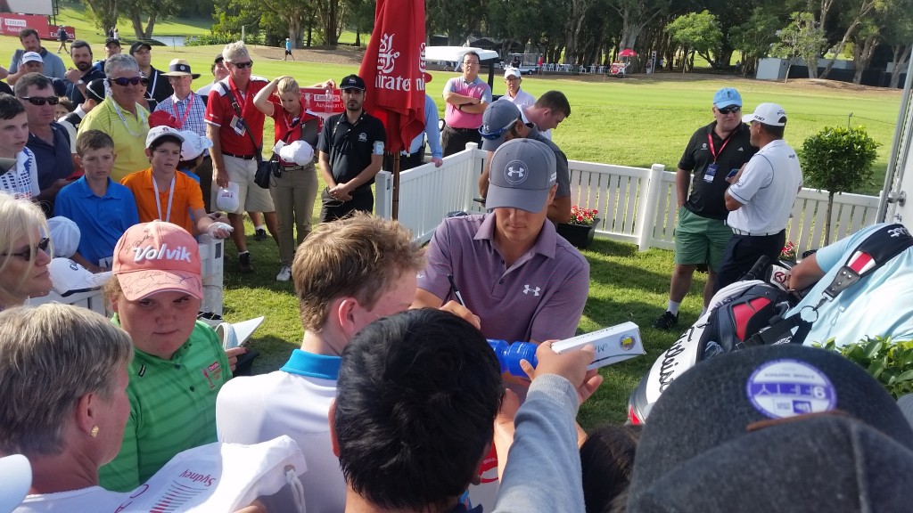 Jordan Spieth signing autographs after his second round.