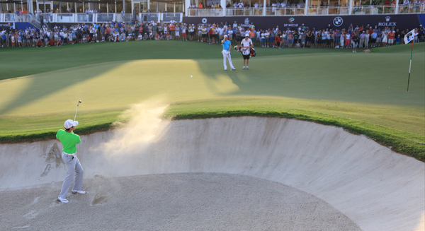 Rory McIlroy executes the shot of the day on day one of the DP World Tour Championship - Holing his bunker shot for birdie at the final hole. (Photo - Fran Caffrey/www.golffile.ie)