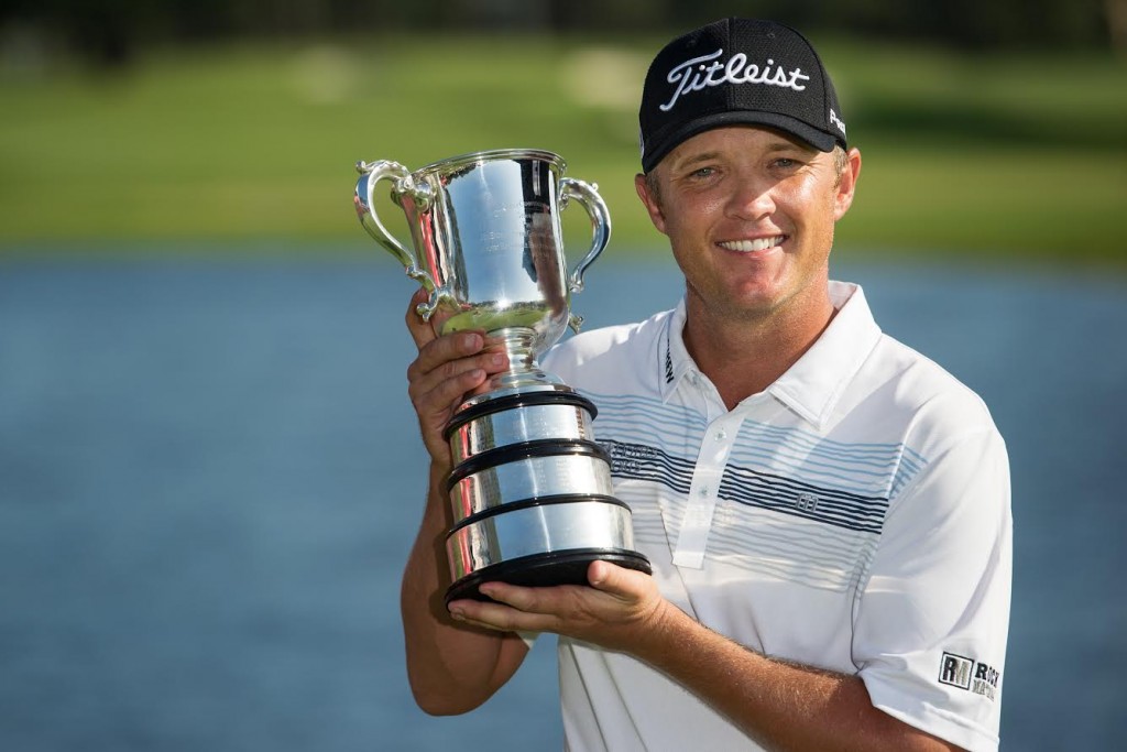 Matt Jones proudly holds aloft the Stonehaven Trophy (Photo - Anthony Powter/www.golfgrinder.com)