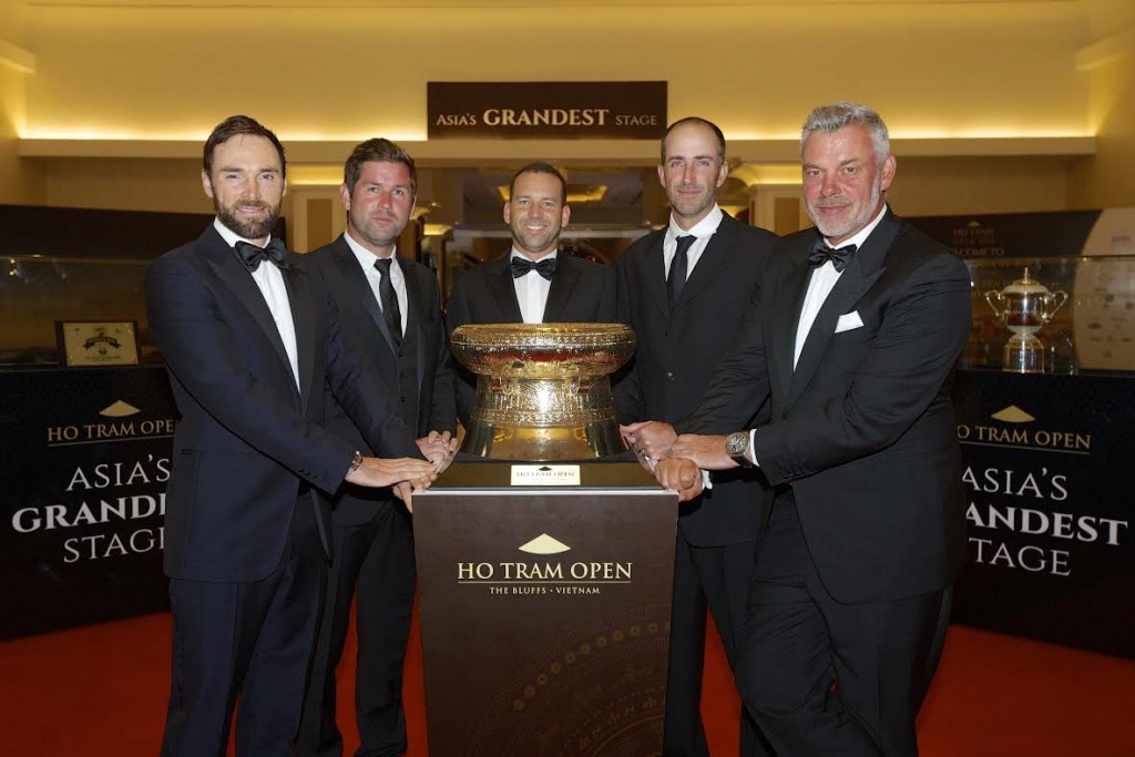 Darren Clarke and the stars of the Ho Tram Open gather around the gleaming trophy.