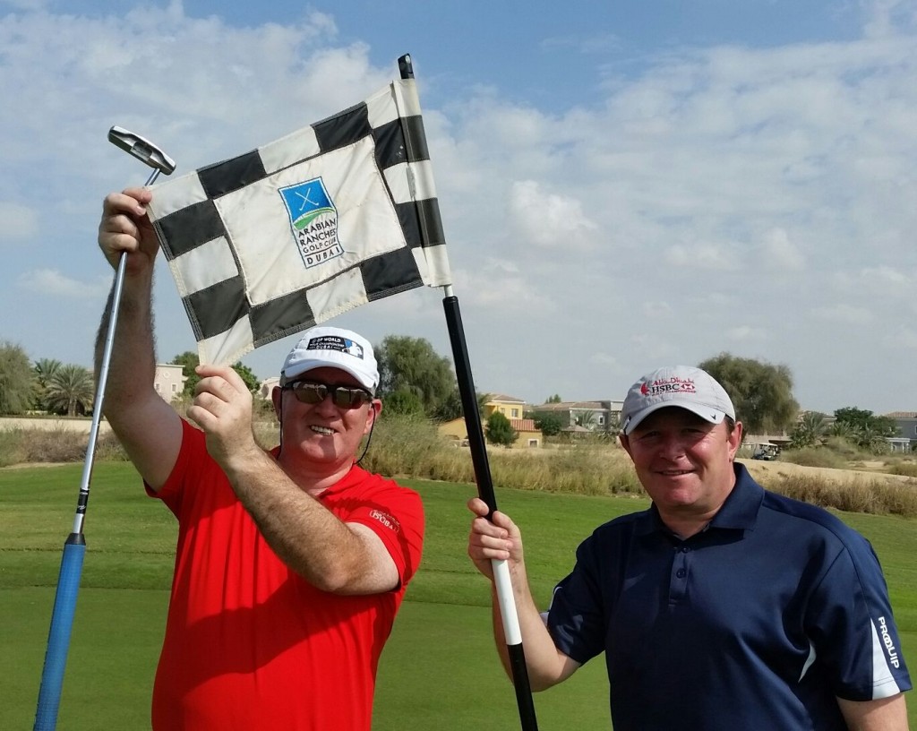 Stuart Adams and Denis Kirwan enjoying their round of golf at Arabian Ranches.