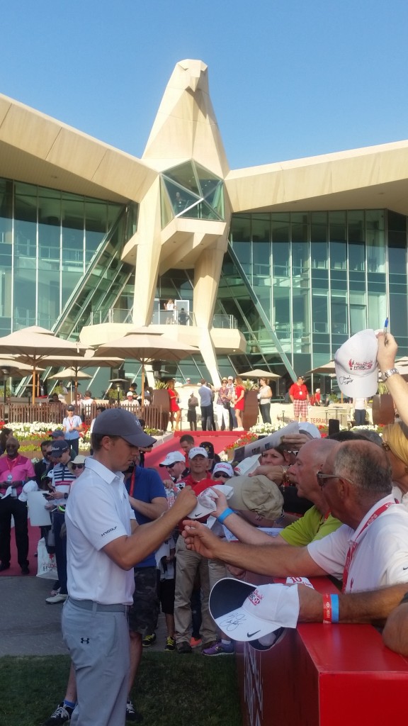 Jordan Spieth happy to sign autographs after his final round in the Abu Dhabi HSBC Championship.