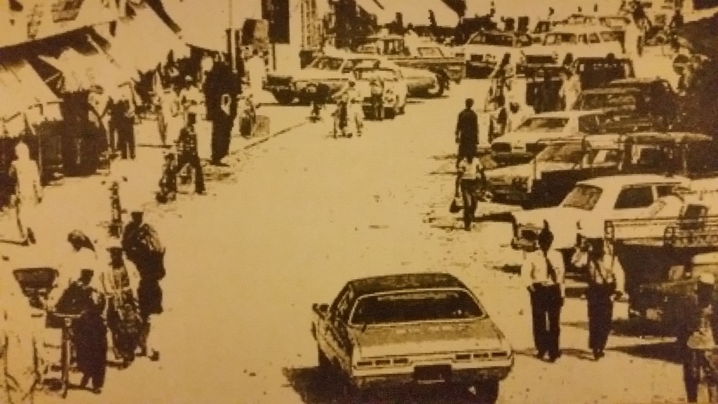 Believe it or not but this is photograph made of tiles of a scene back in the 1960s of the Doha souq.