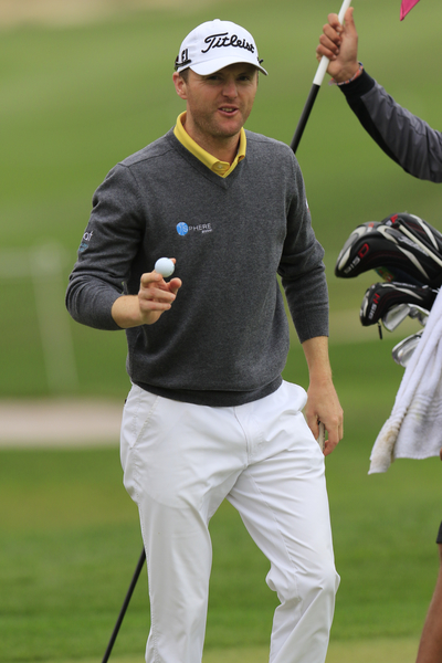 Michael Hoey (NIR) sinks his birdie putt on the 18th green during Wednesday's Round 1 of the 2016 Commercial Bank Qatar Masters held at the Doha Golf Club, Doha, Qatar. 26th January 2016. Picture: Eoin Clarke | Golffile All photos usage must carry mandatory copyright credit (© Golffile | Eoin Clarke)
