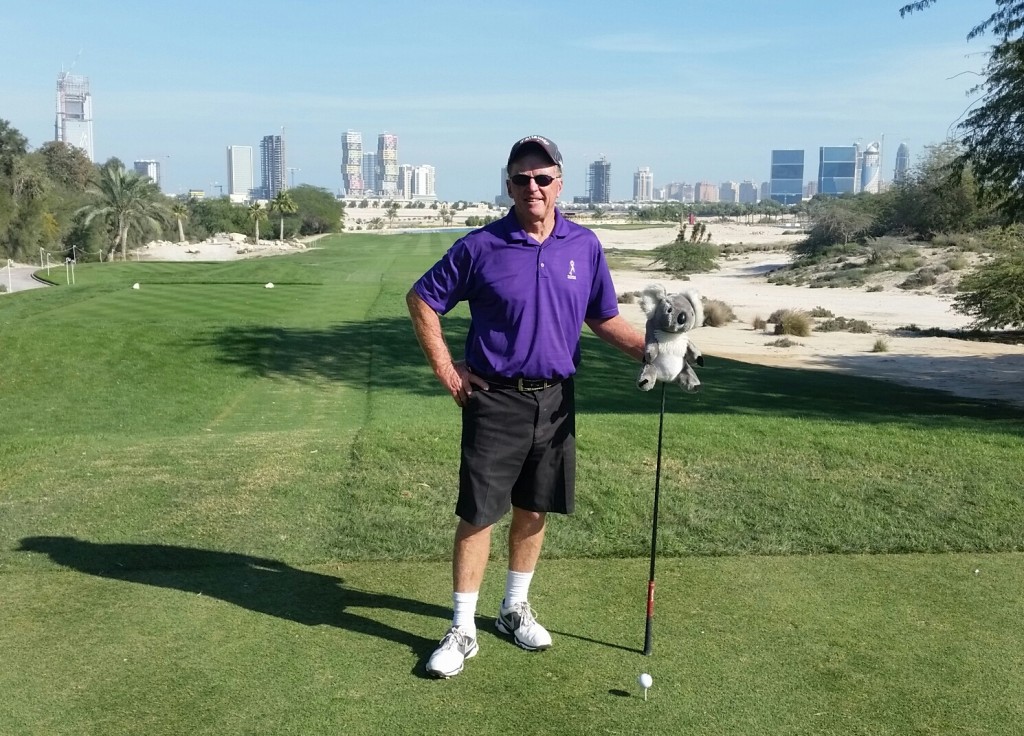 Bernie on the 15th tee and with the ever-changing Doha skyline in the background.