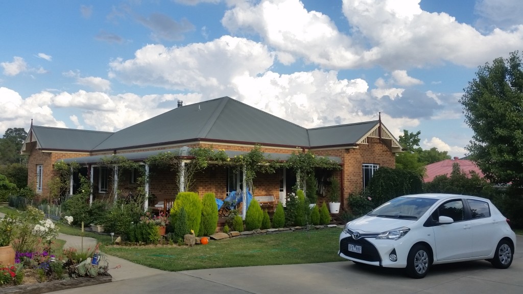 My brother Brian and his family house at Bathurst along with the rental car I drove for two months.