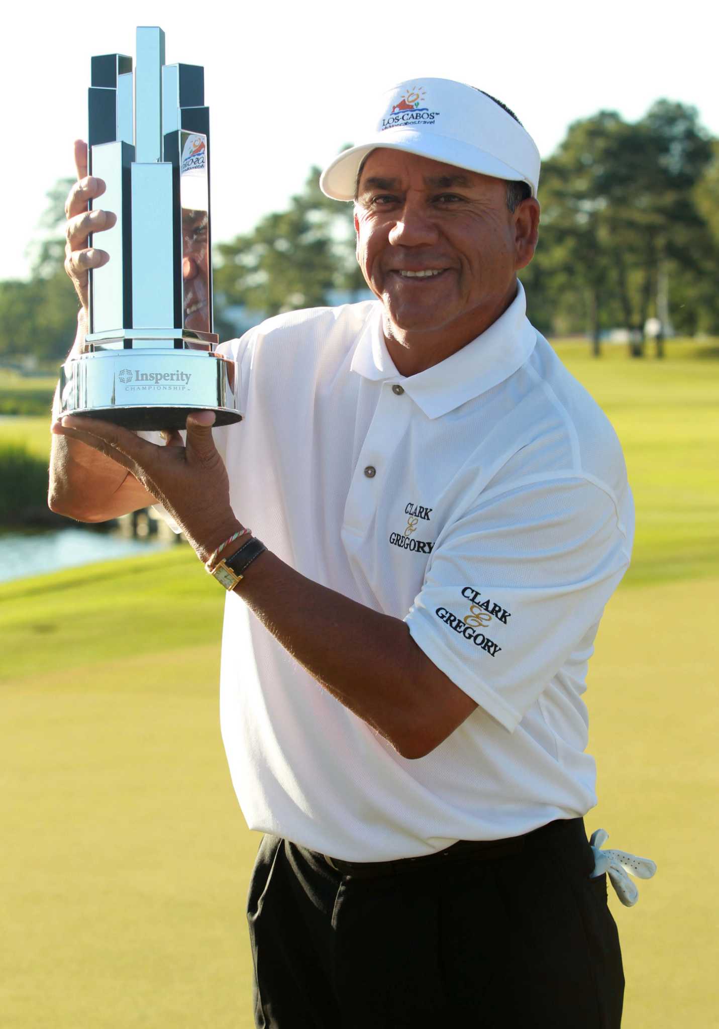 Esteban Toledo with his trophy after defeating Mike Goodes on the third playoff hole during the final round of the Insperity Championship, Saturday, May 4, 2013 at The Woodlands Country Club Tournament Course in The Woodlands, TX. (Photo: Eric Christian Smith/For the Houston Chronicle)