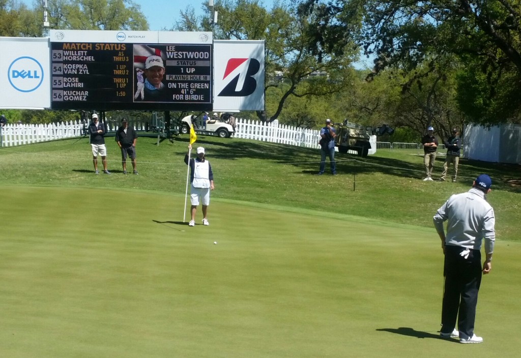 England's Lee Westwood watches his putt on the 18th ahead of claiming victory over Aussie Marc Leishman.