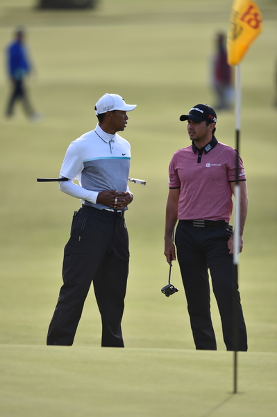 Jason Day and Tiger Woods still in conversation right up to the final green during the second round of last year's Open Championship. (Photo - Fran Caffrey/www.golffile.ie)
