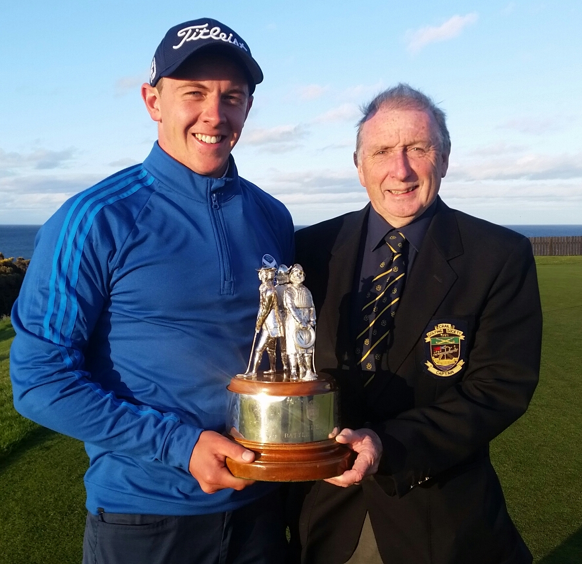 Grant Forrest with Crail Club Captain, David Maiden and the famed Battle Trophy. (Photo - www.golfbytourmiss.com)