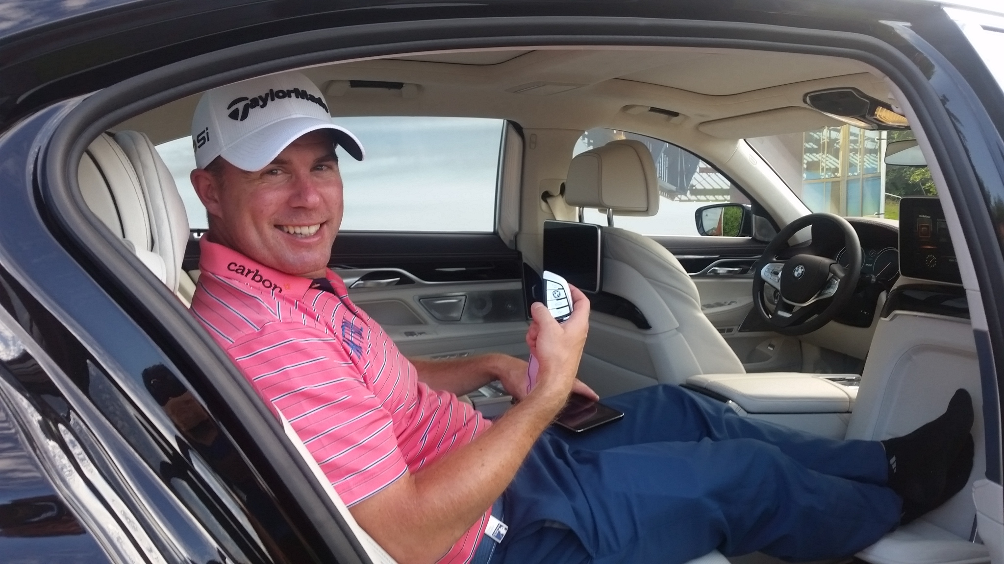 Richie Ramsay puts his feet up in the back of his new BMW luxury limo. (Photo - www.golfbytourmiss.com)