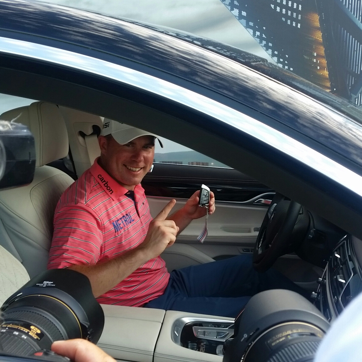 Richie Ramsay behind the wheel of the V-12 BMW 760 Li limo