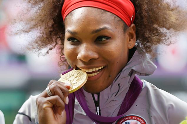 Serena Williams sinks her teeth into her 2012 Olympics Games gold medal but says she is sad the likes of Jason Day is not competing in Rio